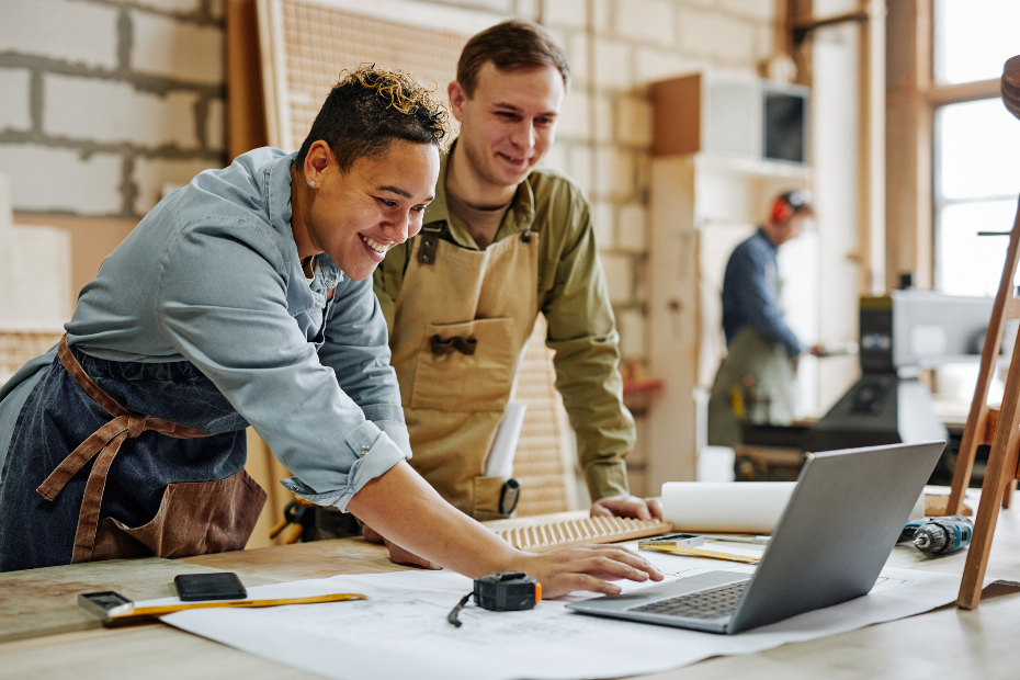 Contractors working at drafting table